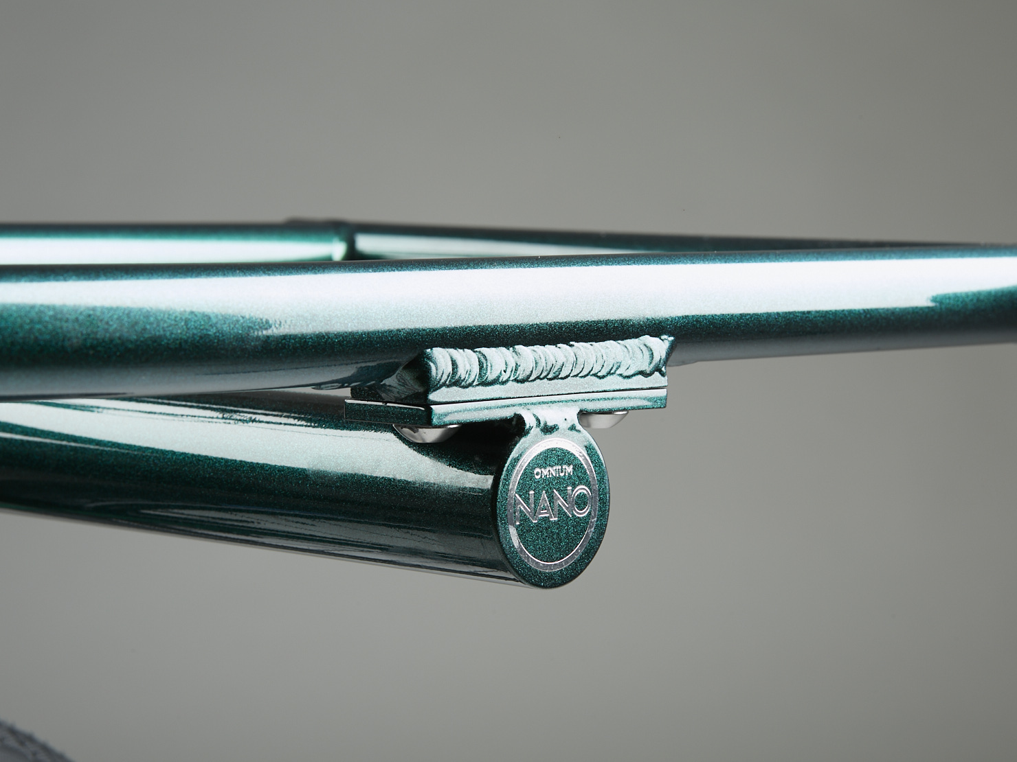 OMNIUM_2026_NANO_GREEN20